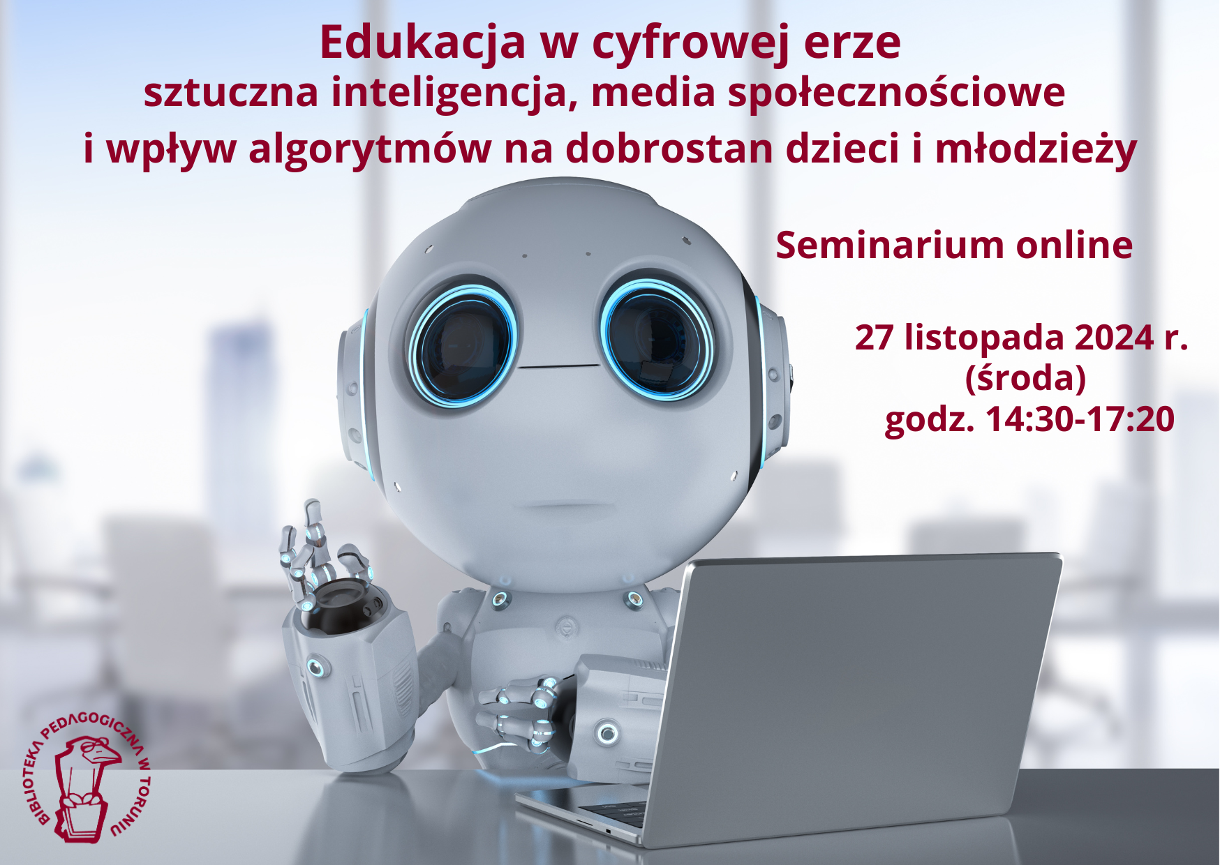 Robot siedzi przy stole i macha ręką.